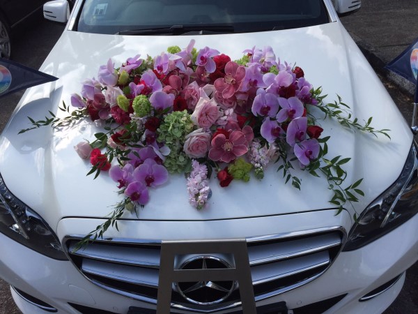 Flower wreath on car